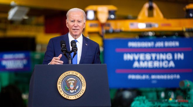 President Joe Biden speaks at a Cummins plant