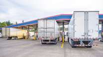Trucks at a fueling station
