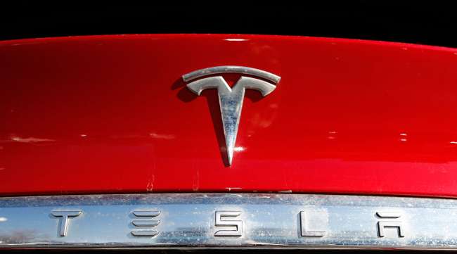 Tesla logo Tesla logo