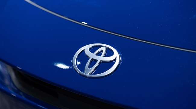 Toyota logo on a Prius plug-in hybrid electric vehicle Toyota logo on a Prius plug-in hybrid electric vehicle