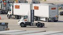 Yellow trucks at a terminal
